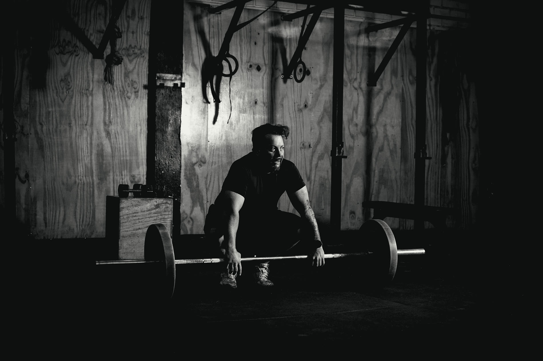 A lifter setting up under a barbell
